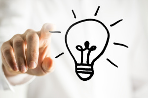Man with a bright idea - a light bulb